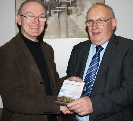 Des Kilbane presents the first DVD to Pat Conway